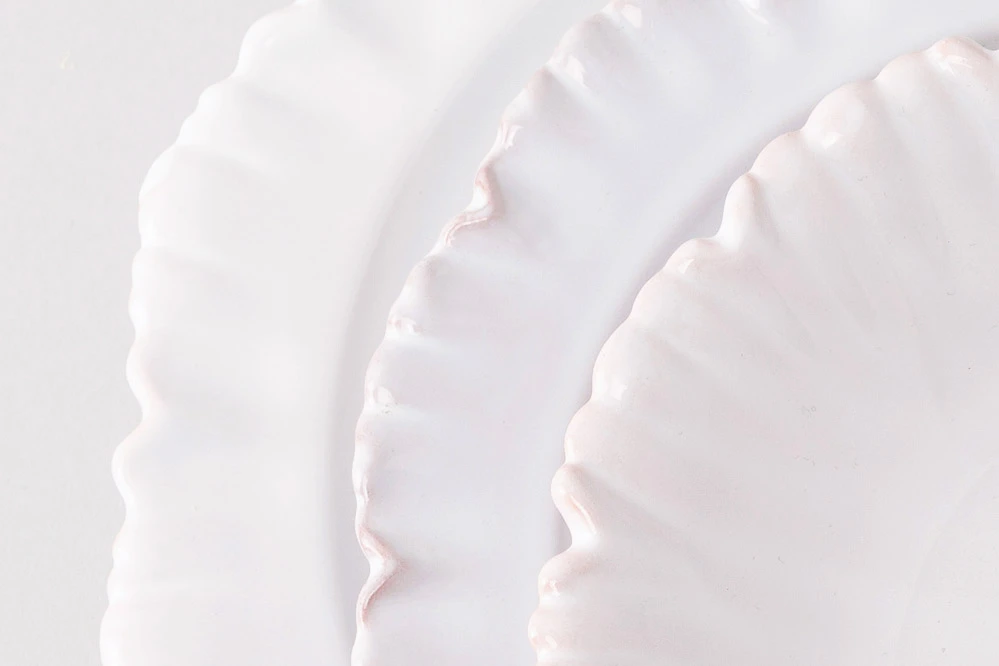 Detail of traditional Sceaux plates in white