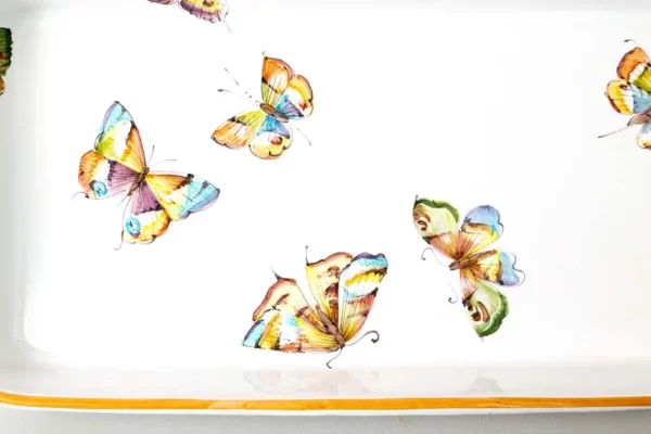 Detail of cake platter with butterflies motif