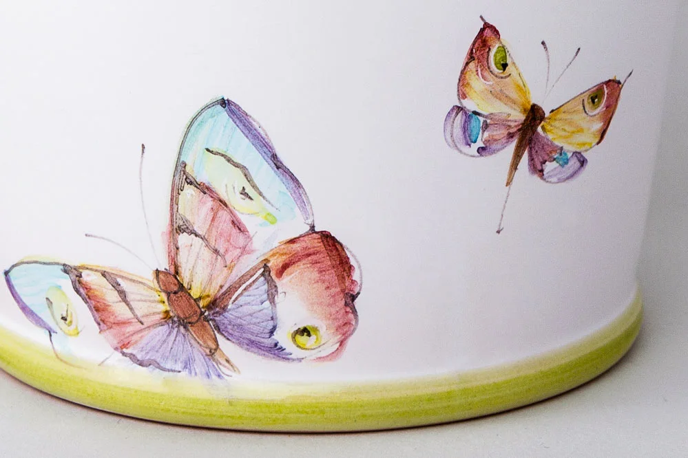 Detail of orchids pot with butterflies motif
