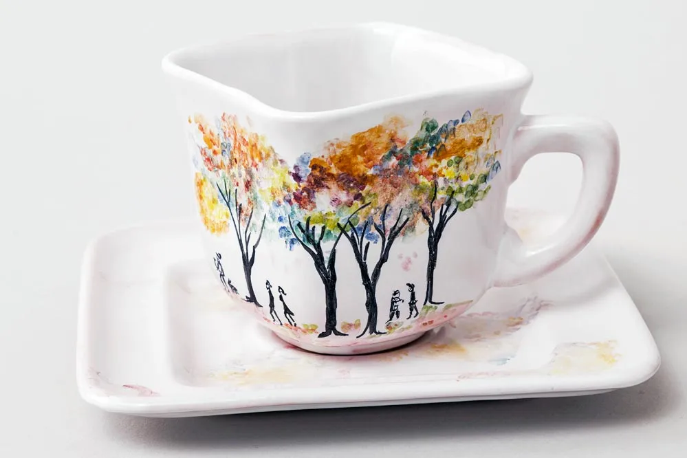 Square cup and saucer with motif designed by Japanese artist Junko Miyoshi
