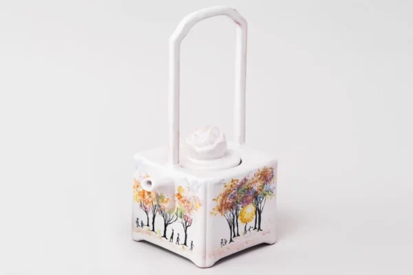 Square teapot with motif designed by Japanese artist Junko Miyoshi