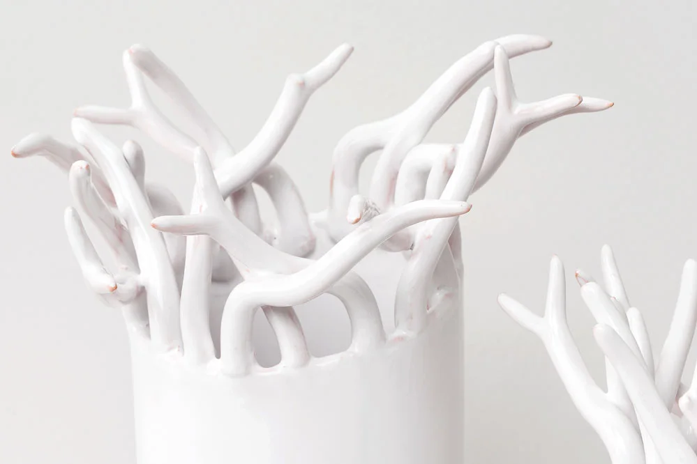 Detail of branch vase in white